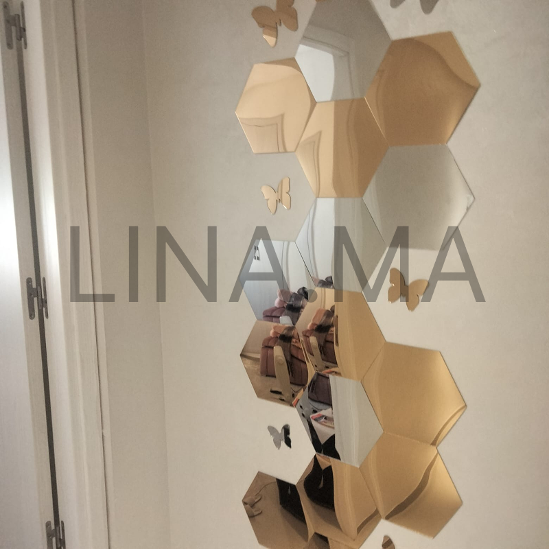 miroir hexagon doré